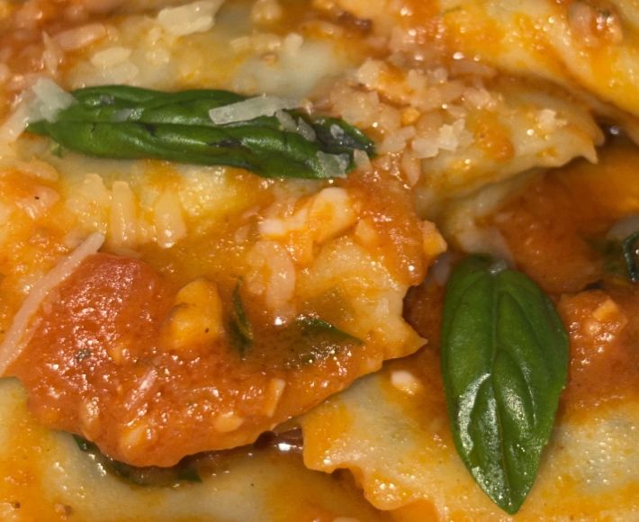 Three Cheese Ravioli in Basil infused Pomodoro sauce.