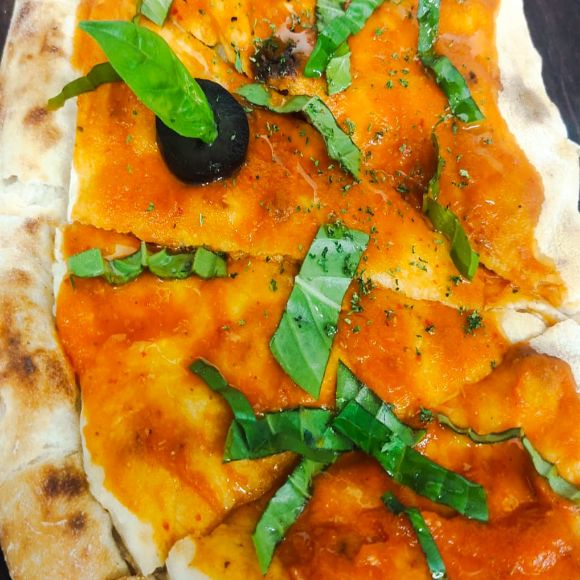 Calzone (crescent shaped stuffed pizza)