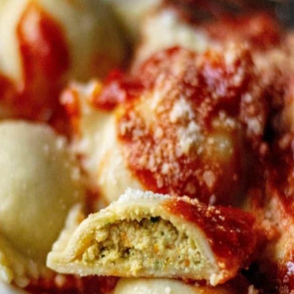 Chicken And Cheese Ravioli in basil infused Pomodoro sauce.